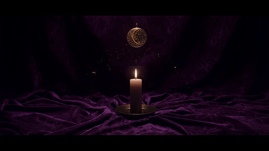 A candle ringed by fine gold planetary lines on dark violet